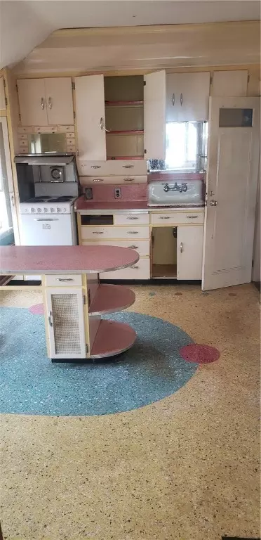 Kitchen - 397 Rathbun St, Woonsocket, RI 02895 photo 2 of 5