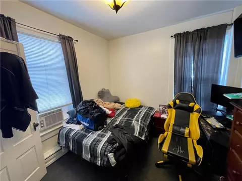 Bedroom - 124 East St, Woonsocket, RI 02895 photo 2 of 7
