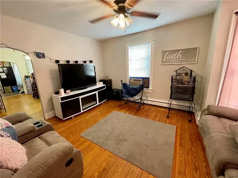 Living - 124 East St, Woonsocket, RI 02895 photo 1 of 2