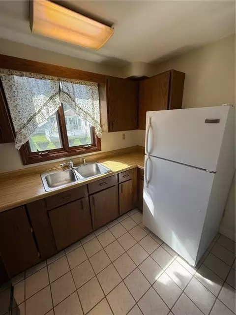 Kitchen - 93 Manila Ave, Woonsocket, RI 02895 photo 2 of 4