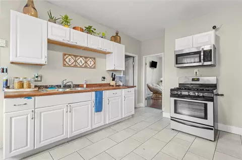 Kitchen - 75 South St, Woonsocket, RI 02895 photo 2 of 7
