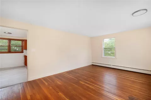 Living - 21 Parsonage Dr, Warwick, RI 02889 photo 1 of 2