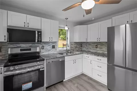 Kitchen - 105 Miles Ave, Woonsocket, RI 02895 photo 1 of 4