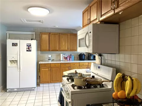 Kitchen - 437 Main St, Woonsocket, RI 02895 photo 7 of 7