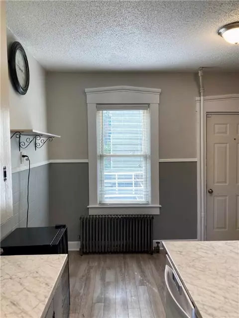 Kitchen - 437 Main St, Woonsocket, RI 02895 photo 5 of 7