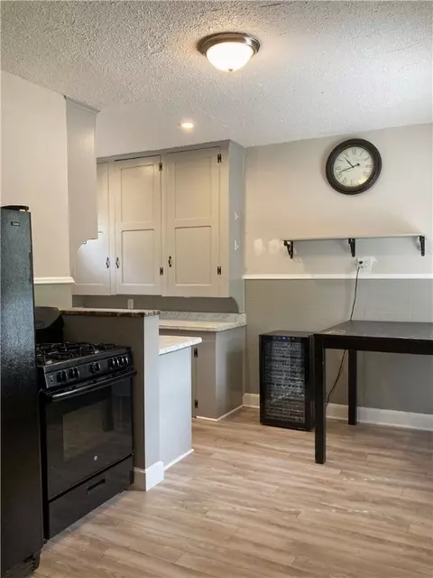 Kitchen - 437 Main St, Woonsocket, RI 02895 photo 1 of 7