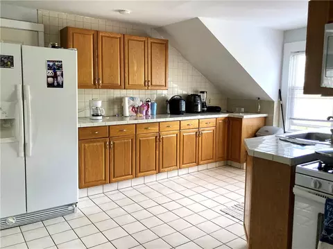 Kitchen - 437 Main St, Woonsocket, RI 02895 photo 6 of 7