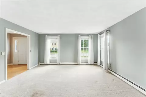 Living - 71 Paddock Dr, Warwick, RI 02886 photo 9 of 11