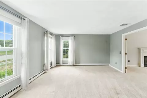 Living - 71 Paddock Dr, Warwick, RI 02886 photo 10 of 11