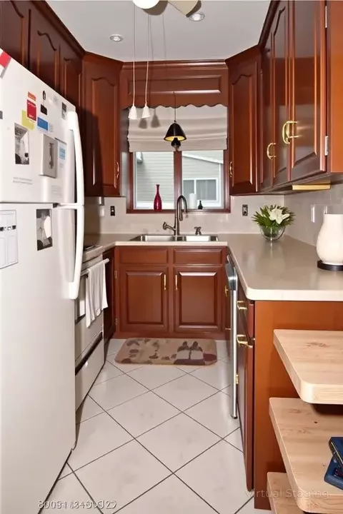 Kitchen - 61 Warwick St, Woonsocket, RI 02895 photo 3 of 4