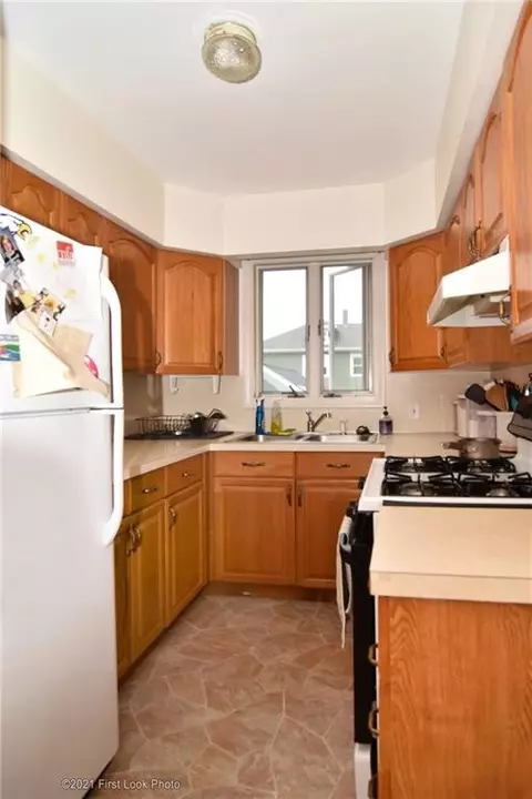 Kitchen - 61 Warwick St, Woonsocket, RI 02895 photo 2 of 4