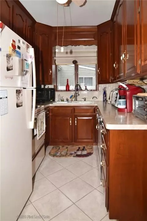 Kitchen - 61 Warwick St, Woonsocket, RI 02895 photo 4 of 4