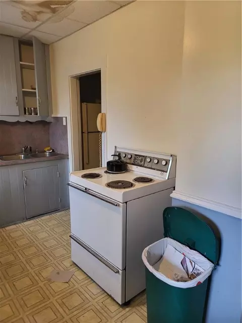 Kitchen - 102 Willow St, Woonsocket, RI 02895 photo 2 of 3