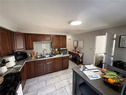 Kitchen - 595 Main St, Woonsocket, RI 02895 photo 2 of 6