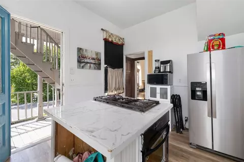 Kitchen - 311 Elm St, Woonsocket, RI 02895 photo 2 of 3