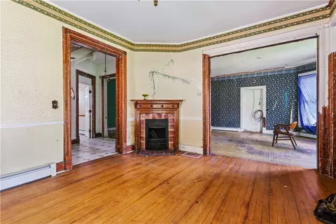 Living - 66 Providence St, Woonsocket, RI 02895 photo 1 of 6