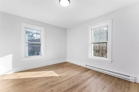 Bedroom - 65 Mill St, Woonsocket, RI 02895 photo 8 of 15