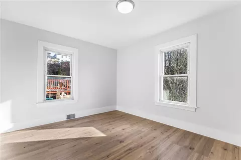 Bedroom - 65 Mill St, Woonsocket, RI 02895 photo 2 of 15