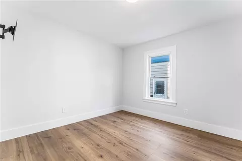 Bedroom - 65 Mill St, Woonsocket, RI 02895 photo 4 of 15