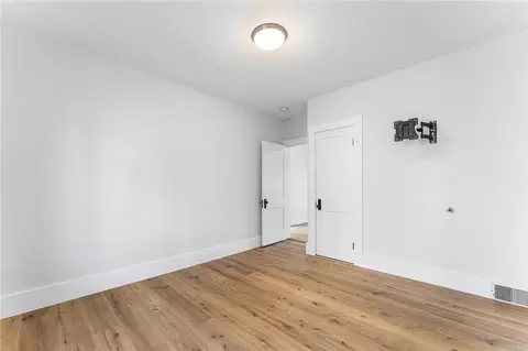 Bedroom - 65 Mill St, Woonsocket, RI 02895 photo 5 of 15