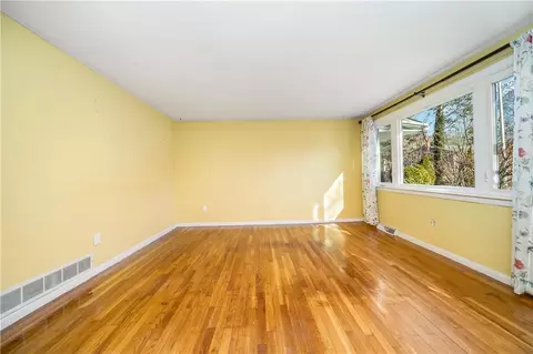 Living - 10 Colonial Rd, Coventry, RI 02816 photo 1 of 2