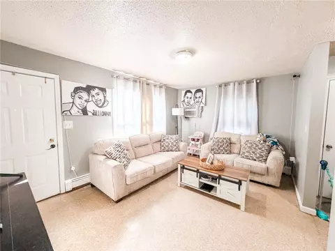 Living - 142 Brook St, Woonsocket, RI 02895 photo 1 of 6