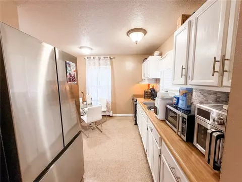 Kitchen - 142 Brook St, Woonsocket, RI 02895 photo 2 of 5