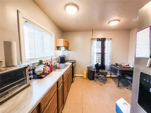 Kitchen - 142 Brook St, Woonsocket, RI 02895 photo 4 of 5