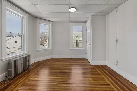 Living - 34 Heroux Ave, Woonsocket, RI 02895 photo 10 of 11