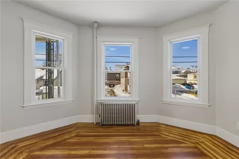 Living - 34 Heroux Ave, Woonsocket, RI 02895 photo 6 of 11