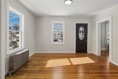 Living - 34 Heroux Ave, Woonsocket, RI 02895 photo 1 of 11