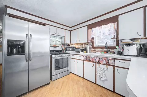 Kitchen - 374 Thibeault Ave, Woonsocket, RI 02895 photo 3 of 4