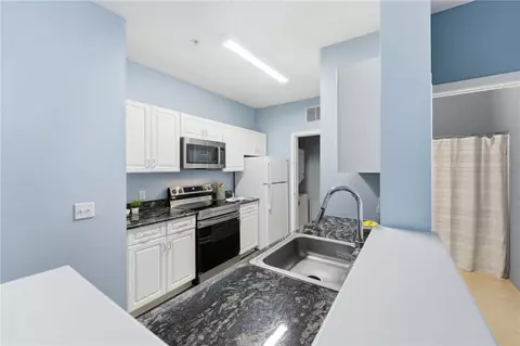 Kitchen - 108 Mill St #104, Woonsocket, RI 02895 photo 2 of 6