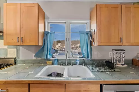 Kitchen - 87 Kermit St, Woonsocket, RI 02895 photo 5 of 6