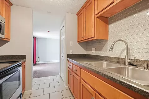 Kitchen - 155 Saint Barnabe St #B1, Woonsocket, RI 02895 photo 6 of 6