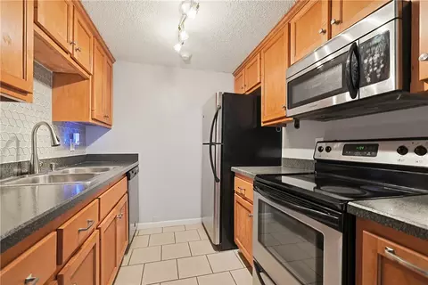 Kitchen - 155 Saint Barnabe St #B1, Woonsocket, RI 02895 photo 2 of 6