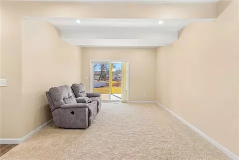 Living - 180 Bertenshaw Rd, Woonsocket, RI 02895 photo 2 of 2