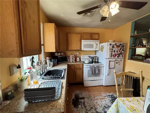 Kitchen - 68 Uncas St, Warwick, RI 02889 photo 2 of 2
