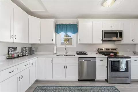 Kitchen - 213 St Louis Ave, Woonsocket, RI 02895 photo 2 of 4