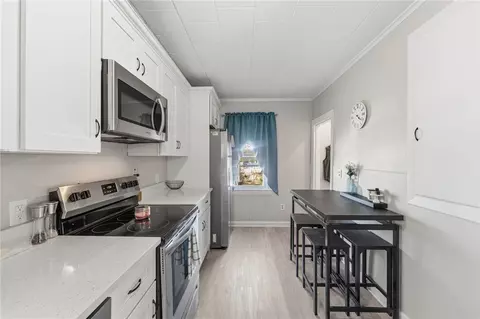 Kitchen - 213 St Louis Ave, Woonsocket, RI 02895 photo 3 of 4