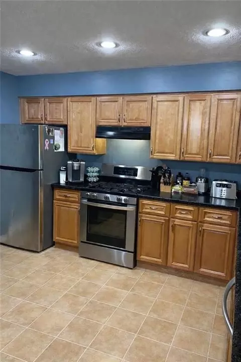 Kitchen - 63 Capwell Ave, Woonsocket, RI 02895 photo 2 of 2