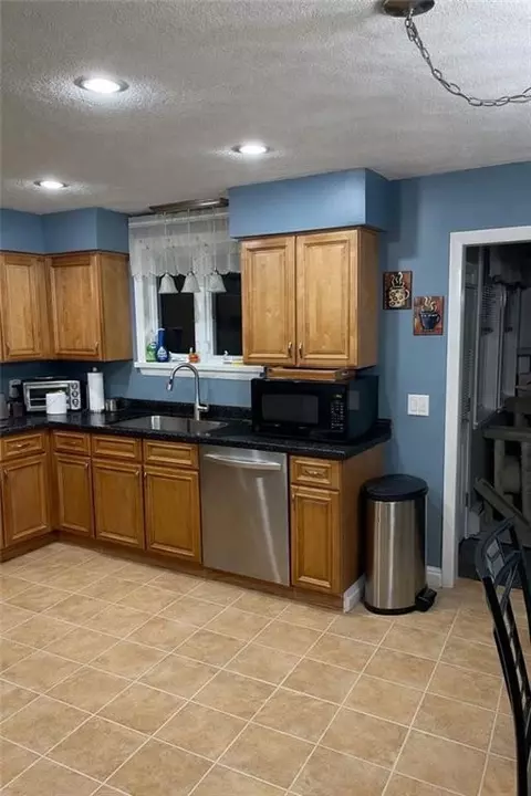 Kitchen - 63 Capwell Ave, Woonsocket, RI 02895 photo 1 of 2