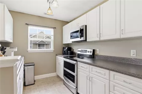 Kitchen - 114 Mill St #303, Woonsocket, RI 02895 photo 2 of 5