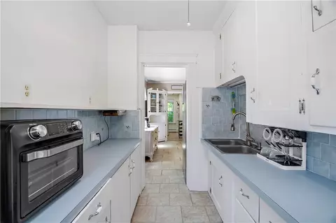 Kitchen - 195 Talcott St, Woonsocket, RI 02895 photo 2 of 2