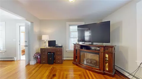 Living - 127 3rd Ave, Woonsocket, RI 02895 photo 1 of 2