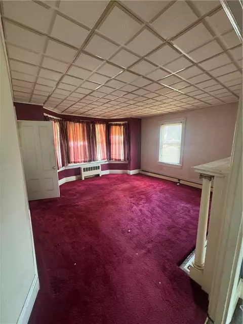 Living - 227 Rathbun St, Woonsocket, RI 02895 photo 1 of 6