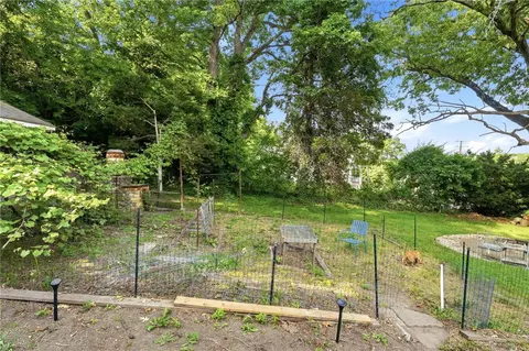 Exterior - 203 Mount Saint Charles Ave, Woonsocket, RI 02895 photo 6 of 10