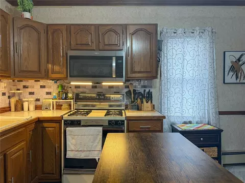 Kitchen - 65 Bellingham St, Woonsocket, RI 02895 photo 3 of 8