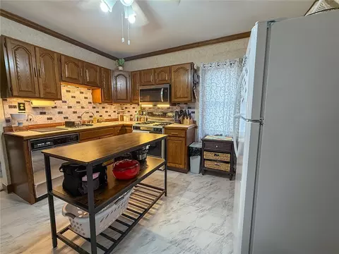 Kitchen - 65 Bellingham St, Woonsocket, RI 02895 photo 2 of 8