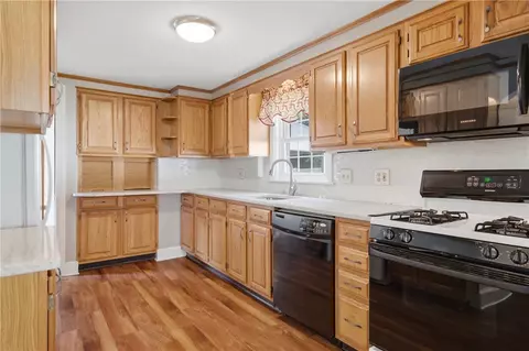 Kitchen - 74 Macarthur Rd, Woonsocket, RI 02895 photo 2 of 3